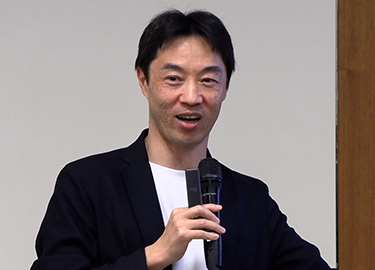 金間 大介